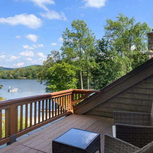 A quiet perch among the trees — this upper deck is perfect for morning coffee, evening chats, or simply taking in the view.