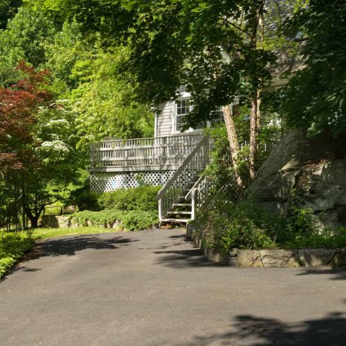 A private driveway provides parking for two vehicles, making arrivals and unloading simple and convenient.
