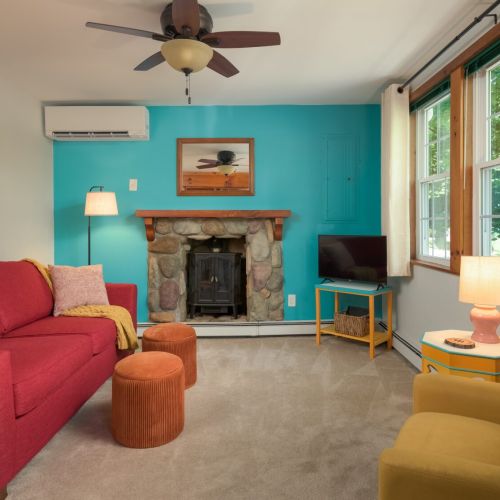 Gather around the electric fireplace, curl up with a blanket, or settle in for a cozy movie night after a day of exploring.