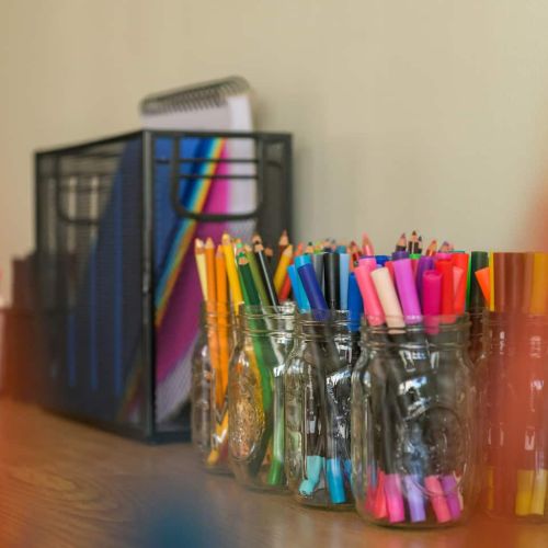 Markers, paper, and more - everything’s tucked neatly into this cozy craft corner, just waiting to be explored.