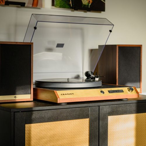 From work calls to vinyl vibes - the office blends function and comfort with a proper desk, cozy reading chair, and a little music corner tucked into the closet.