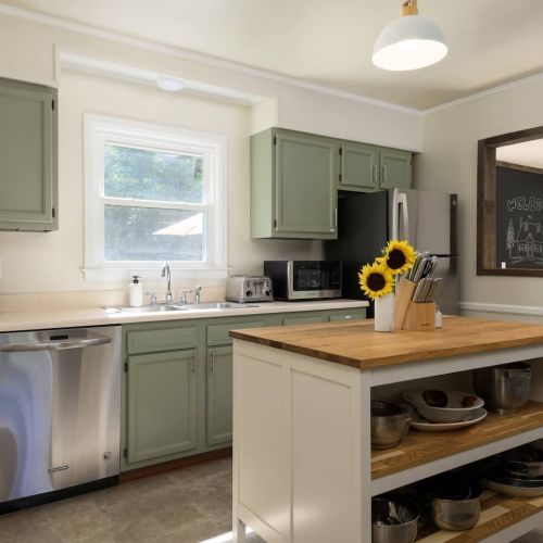 Whether you're whipping up breakfast or grilling out back, the kitchen is equipped with everything you need - including a drip coffee maker, Brita filter, and all the essentials.