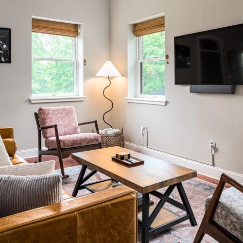Cozy up for a movie night or unwind with your favorite show - this living room is perfect for after dinner drinks and chats.