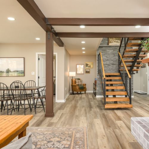 Dine, chat, or play a game at the heart of the home - this open-concept space keeps everyone connected, from kitchen to lakeview table.
