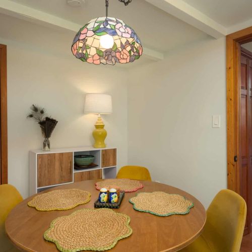 Tucked just off the kitchen, the dining room offers an inviting space for meals, game nights, and easy access to the backyard.