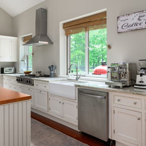 Designed for ease and gathering, the kitchen is both a place to prep and a place to pause.
