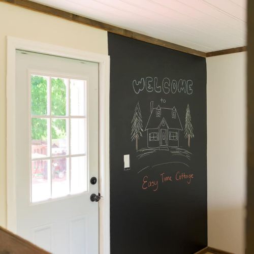 A close-up of the chalkboard invites little hands (and big ideas) - perfect for doodles, messages, or a family game of tic-tac-toe.