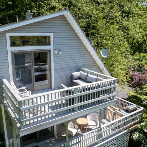Enjoy your own private balcony, the perfect spot for morning coffee, afternoon reading, or unwinding beneath the trees.