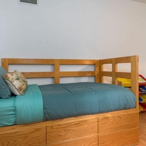A quiet nook for solo sleepers—this cozy twin room is perfect for kids, teens, or a little extra privacy.