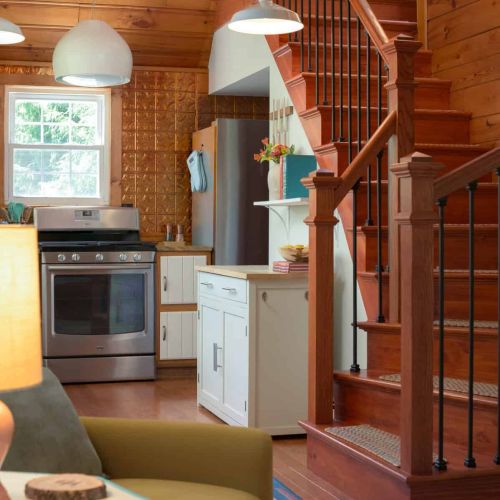 Original woodwork, soaring ceilings, and thoughtful updates create a space that feels both timeless and comfortable.