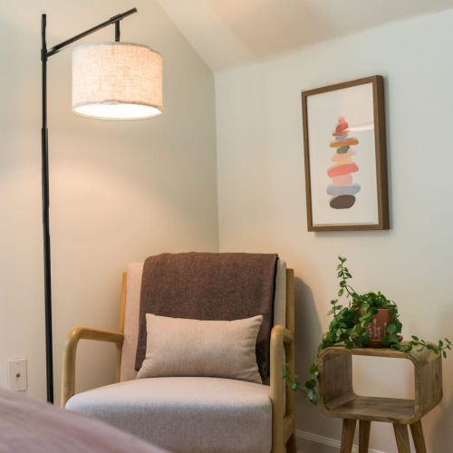 Tuck into the corner chair with a good book and a cup of tea - this peaceful nook is perfect for solo moments or end-of-day wind-downs.