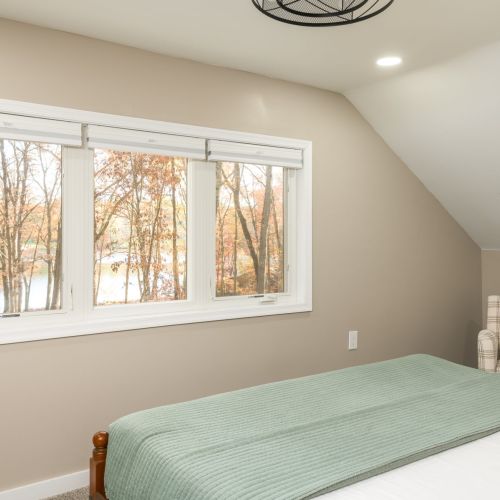 Wake up to calming lake views from the comfort of a king bed, or settle into one of two accent chairs for morning coffee with a view.