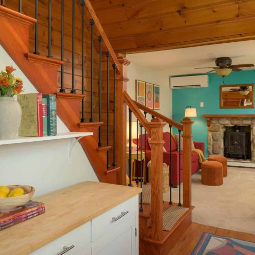 The open layout makes it easy to move between the kitchen, living room, and loft.
