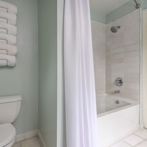 Whether it’s a bubble bath or a speedy shower, this upstairs bathroom is designed with comfort and convenience in mind.
