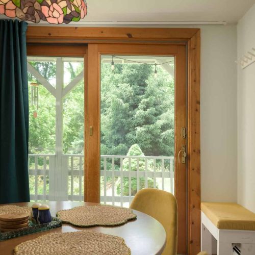 Gather around the table for a slow breakfast, then step through the sliding doors to enjoy coffee on the deck surrounded by trees.