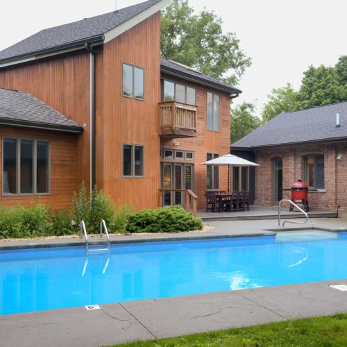 Your private outdoor haven – fire up the grill, dine under the sky, or curl up with a good book in the fresh air. Pool is heated and saltwater, available from Mid-May to Mid-September.