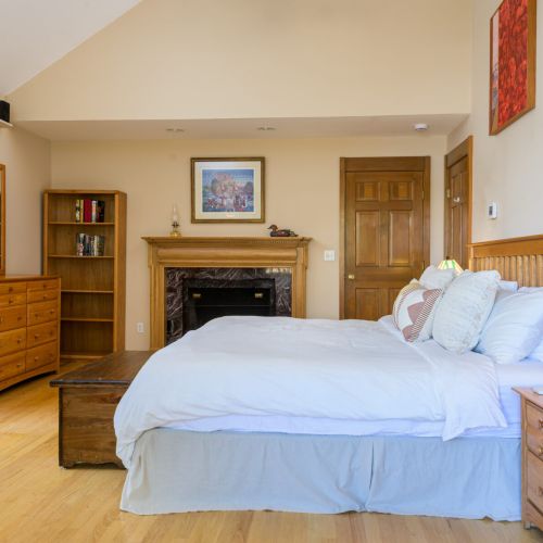 Your personal retreat — cozy up in the king bed, enjoy the charm of the decorative fireplace, and step out to a deck designed for sunrise coffees or sunset wind-downs.