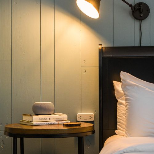 Each bedroom is thoughtfully stocked with a soft-glow lamp and a white noise machine - because restful sleep is all in the details.