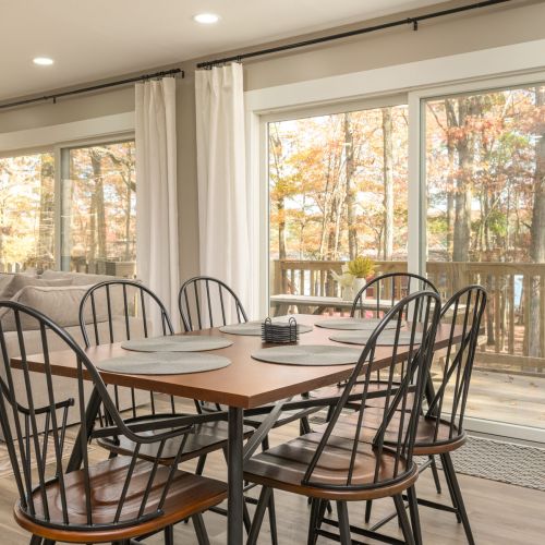 Share slow breakfasts and dinners at this lakeview table for eight - just steps from the fireplace and full kitchen (we've since updated the table to an 8 seater)