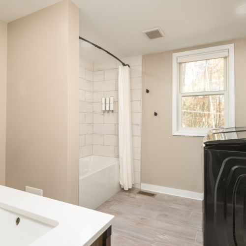 Clean, convenient, and family-friendly - enjoy the comfort of a full tub and the ease of having a washer and dryer right where you need them.