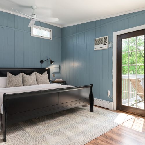 Tucked upstairs, the serene primary suite features a plush king bed with Nectar mattress, walk-in closet and porch with screen doors. Your private haven after a day of exploring the valley.