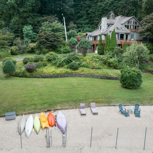Aqua Lodge’s private sandy stretch is perfect for sunbathing, launching a kayak, or kicking back in a beach chair with a good book.