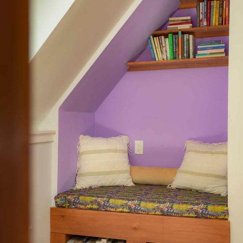 Browse the collection of books and settle into this charming nook for a quiet afternoon.