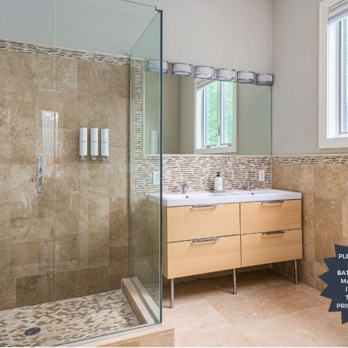 Spacious and functional, this main floor bath features a standing shower, double vanity, and all the essentials - shared with ease, designed for comfort.