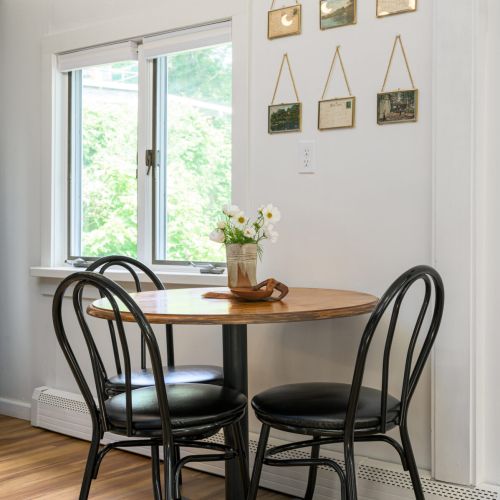 Enjoy bright mornings in the kitchen with eating for 4 (only 3 shown in the photos)