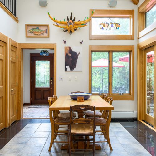 Start the day gathered here — perfect for sipping coffee, playing cards, or keeping the cook company.