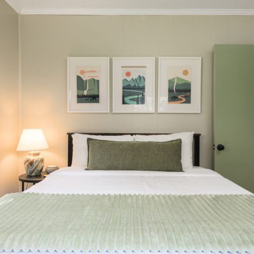 Rest easy in the cozy downstairs bedroom, complete with a queen bed and Nectar mattress, smart TV, and blackout shades for a peaceful night’s sleep.